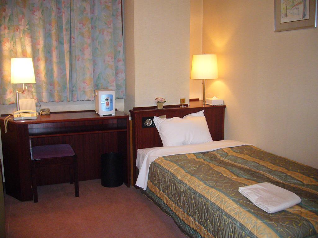 City Hotel Ikeda Okayama Rom bilde